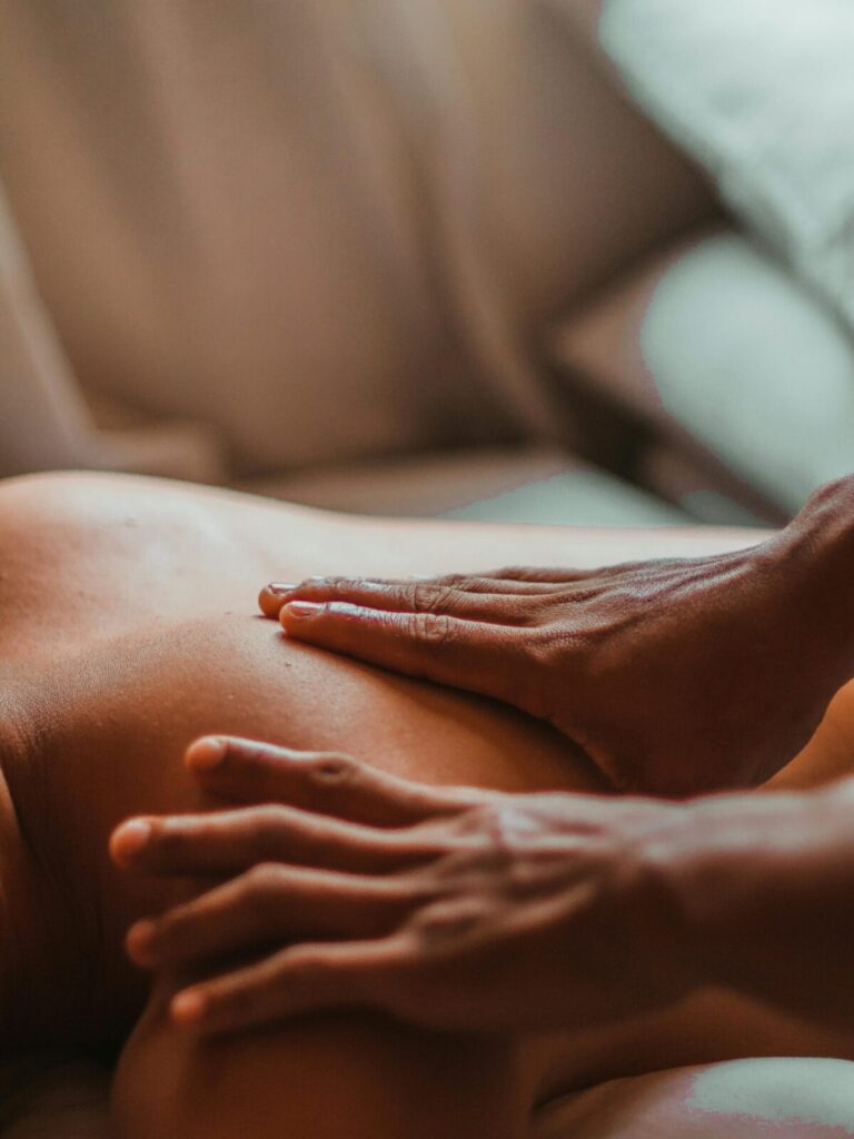 A soothing back massage session in a spa setting, focusing on wellness and relaxation.
